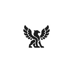Fototapeta premium Black silhouette of a griffin with outspread wings