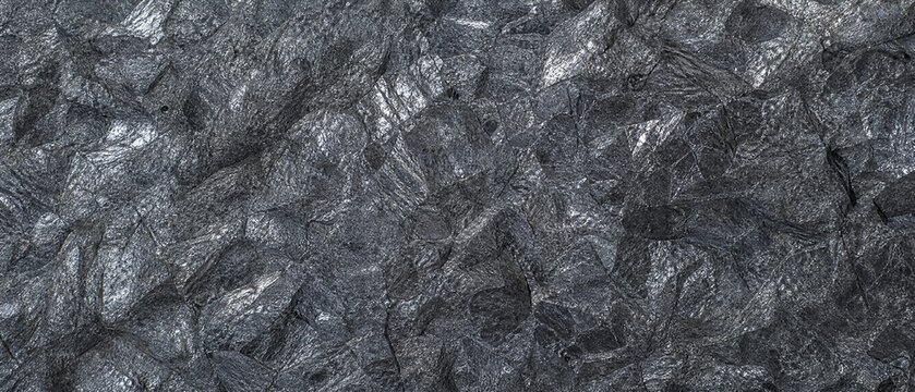 Close-up texture of rough black carbon fiber surface background