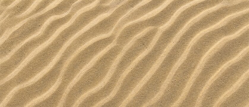 Golden sand texture with smooth ripples and natural background