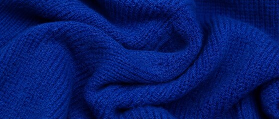 Fototapeta premium Blue knitted fabric texture background