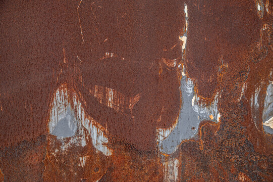 Heavy Rust Metal Texture Background, Heavily Corroded Iron Sheet with Peeling Paint and Rough Weathered Metallic Surface.
