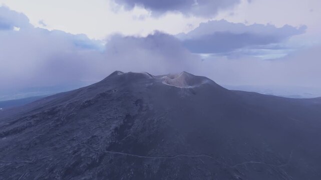 Circular aerial view at sunrise of Mount Etna volcano craters in Catania. Bronte. Italy