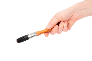 Woman hand holding Paint brush isolated on white background © ibrahimtaylan