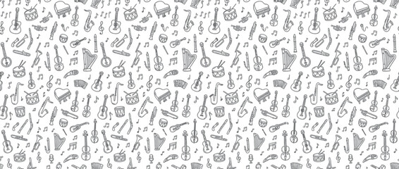 Hand-Drawn Musical Instruments and Notes Seamless Pattern © heru