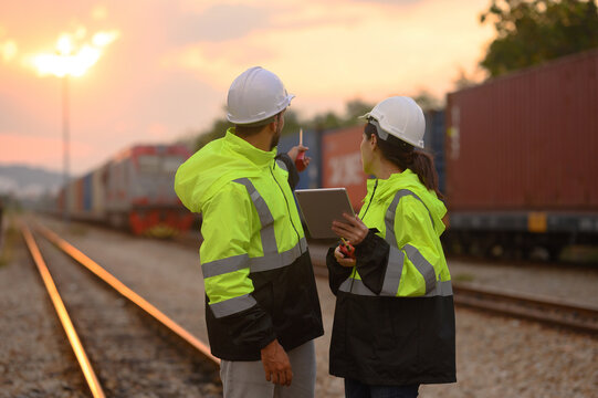 Workers are inspecting the condition of containers ready for shipment abroad.