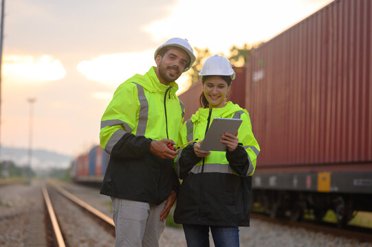 Workers are inspecting the condition of containers ready for shipment abroad.
