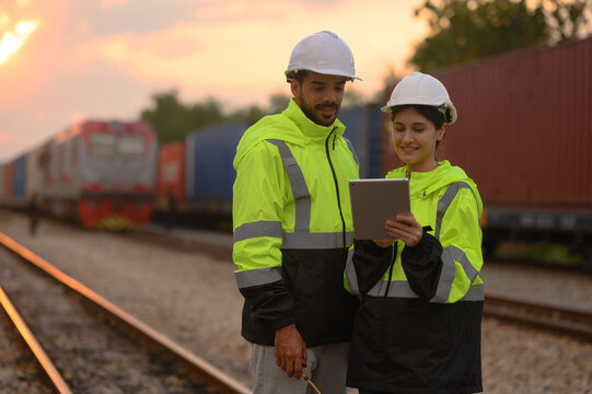 Workers are inspecting the condition of containers ready for shipment abroad.