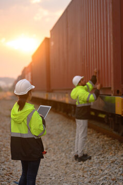Workers are inspecting the condition of containers ready for shipment abroad.