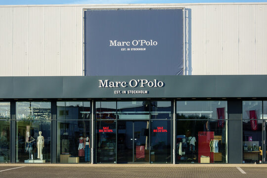 Mulheim Karlich, Germany - July 13, 2026: Marc O'Polo fashion boutique storefront featuring the brand logo and Sale bis zu 50 percent signs in display windows