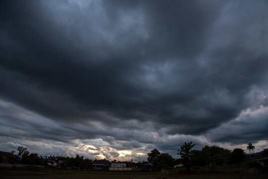 Dark cloudscape storm disaster gloomy gray cloud sky. Meteorology danger windstorm disasters climate. Dramatic dark storm rain clouds black sky background. Dark thunderstorm clouds rainny atmosphere