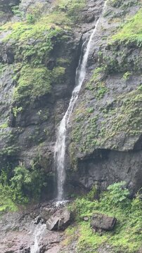 Scenic monsoon waterfall flowing through Bhimashankar Wildlife Sanctuary, Maharashtra, India in stunning 4K.