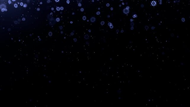 Particles float in a dark blue void creating a soft abstract atmosphere that provides ample copy space for design projects.