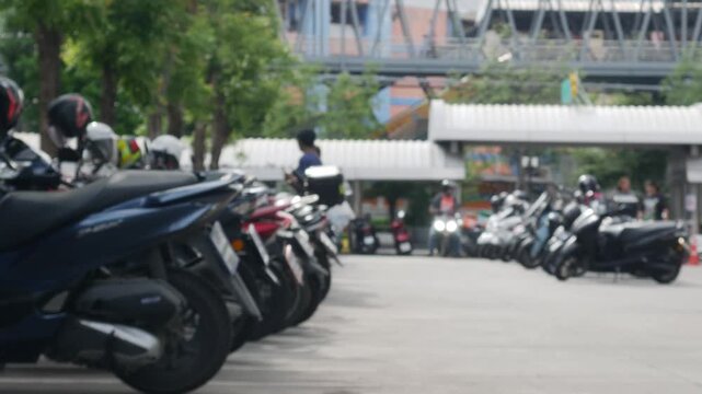 Blurred Defocused Crowded Motorcycle Parking Lot with Trees Outside Urban Shopping Area Street Lifestyle 