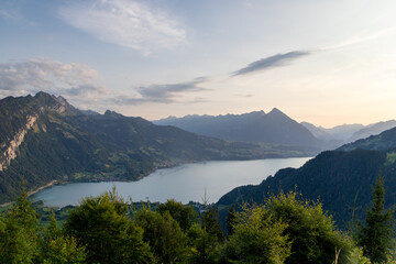 Obraz premium Sunset Over Lake Thun and Bernese Alps from Harder Ridge, Bernese Oberland, Switzerland