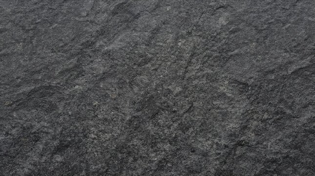 Seamless dark gray stone texture background macro photograph