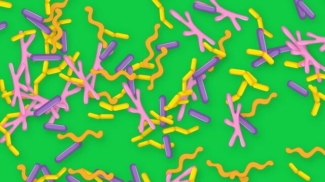 Colorful Abstract Microscopic Organisms Falling Over a Green Screen Background