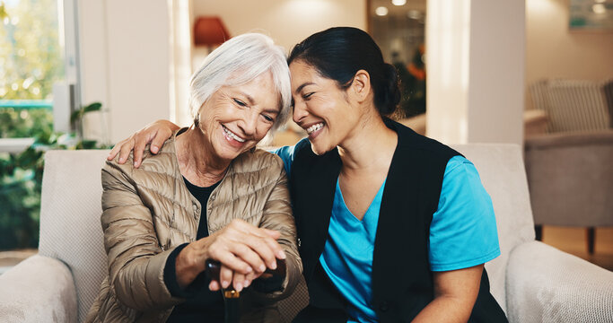 Retirement, caregiver and senior woman on sofa with conversation, hug or comfort at nursing home. Homecare, old person with cane and nurse with healthcare, discussion and advice in living room
