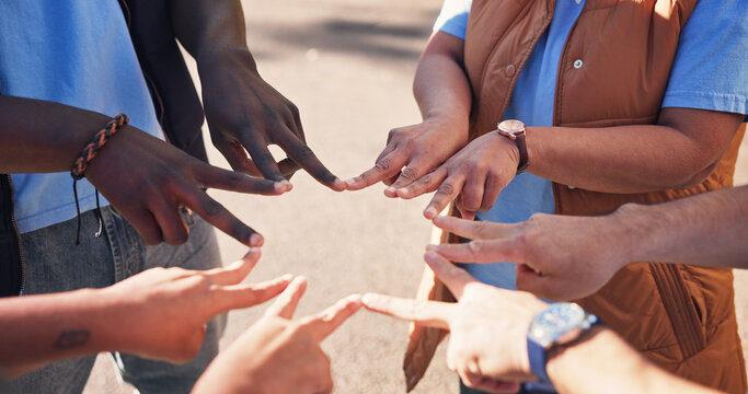 Nature, group and people with star hands for support, solidarity and trust in non profit organization. Bonding, teamwork and circle of volunteers with fingers together for connection in ngo at park.