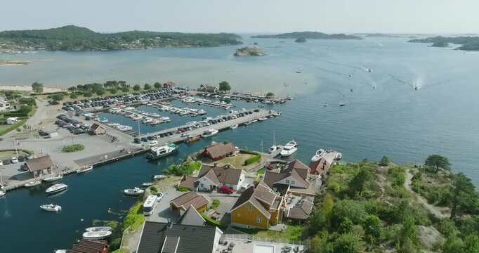 Aerial view of coastal marina and residential area in H&oslash;llen Norway