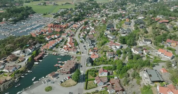 Aerial view of coastal marina and residential area in H&oslash;llen Norway