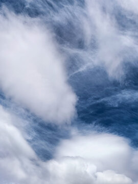 Large White Clouds Over Dramatic Blue Sky