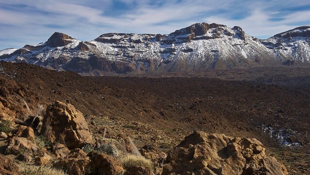 Mirador El Tabonal Negro, rock formations with snow on a mountain under blue sky, Teide, Parque Nacional del Teide, Teide National Park, volcano, volcanism, UNESCO World Heritage Site, Tenerife, Canary Islands, Spain