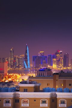 Doha, Qatar - january 8th, 2026: residential area and Doha business hub skyline at night. Iconic illuminated skyscrapers business district luxury middle east gulf colorful night architecture