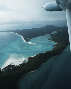 Aerial view of Whitsunday Island beach with airplane propeller, Airlie Beach, Queensland, Australia