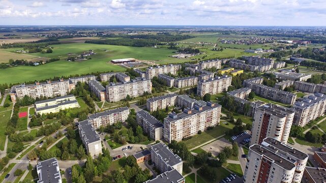 Aerial panoramic view of the southern part of Siauliai city in Lithuania. Old soviet union buildings with green countryside. Siauliai.Lithuania