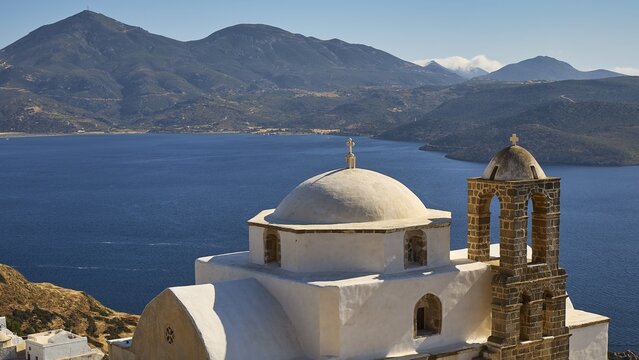 Panagia of Thalassitra church, Panagia Thalassitra, church building with dome and bell tower overlooking the sea and mountains, Plaka, capital on Milos, island of Milos, volcanic island, Cyclades, Greek islands, Greece