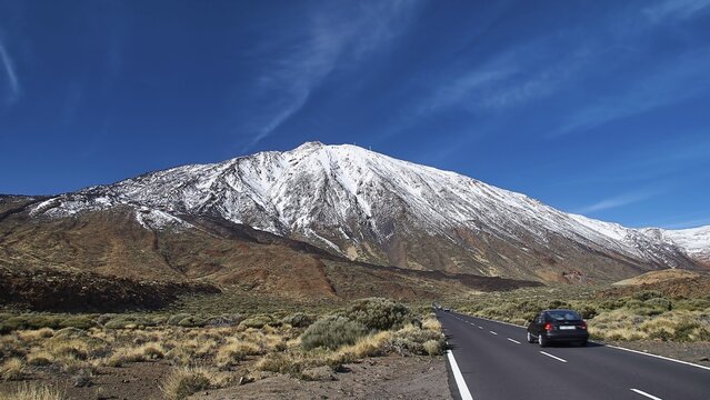 Snowy mountain, road with car, clear blue sky, Teide, Parque Nacional del Teide, Teide National Park, volcano, volcanism, UNESCO World Heritage Site, Tenerife, Canary Islands, Spain