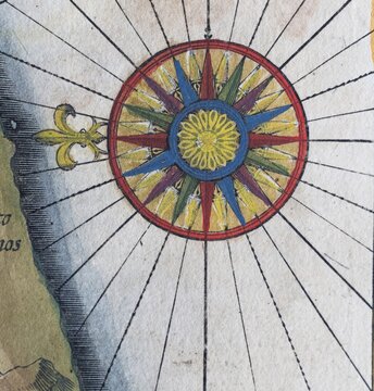 Old coloured map of Ceylon or Sri Lanka decorated with compass rose, by Jodocus Hondius from the Mercator Hondius Atlas, Amsterdam, 1633