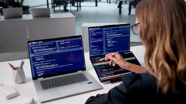 Woman Developer Reviews Code Changes