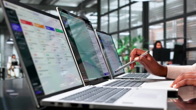 Compliance Manager Reviews Risk Dashboard On Laptop