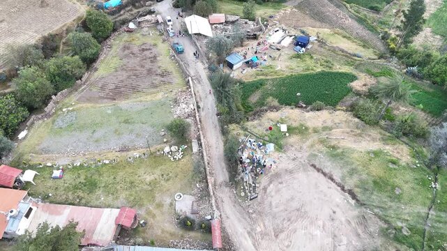 4K Aerial Drone: Destroyed adobe house after an earthquake in Pumpunya, Chongos Alto, Huancayo. Structural collapse in rural Andes, Peru.