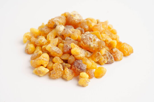 Frankincense or olibanum aromatic resin isolated on white background used in incense and perfumes.