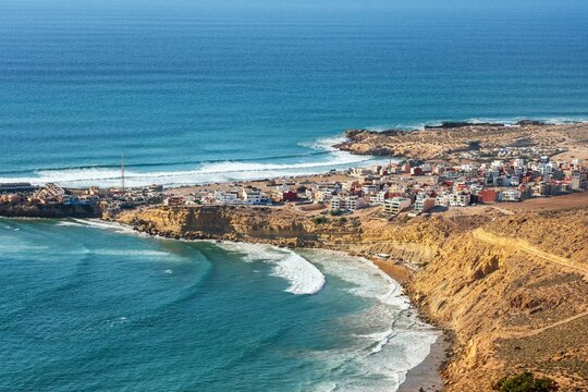 Imsouane colorful coastal village in Morocco with ocean waves