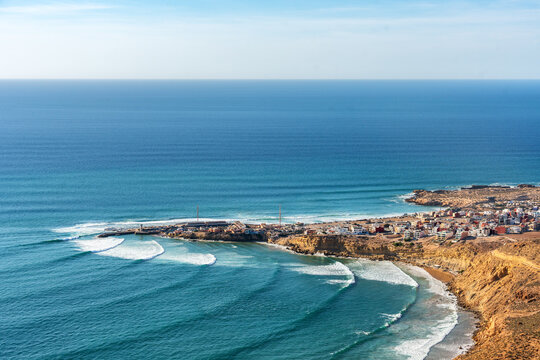 Imsouane colorful coastal village in Morocco with ocean waves