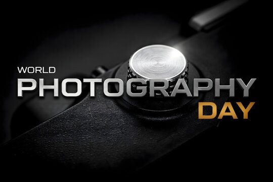World photography day concept with vintage camera button and typography