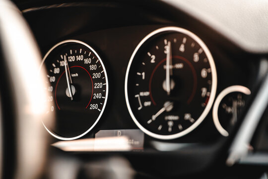 Car dashboard showing speed and rpm during driving