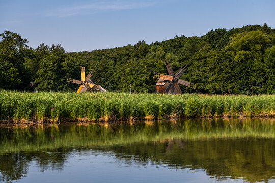Traditional Countryside Windmill near Lake in Romania