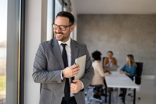 A confident businessman leads in corporate culture, business growth, and global finance