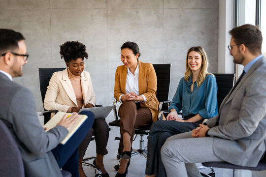 Success group of multiethnic entrepreneurs and business people achieving goals in corporate office