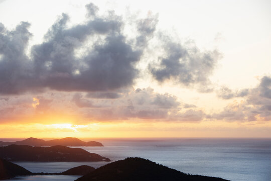 Dramatic sky above ocean at sunrise