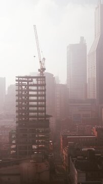 Shanghai, China. Time-lapse Urban Skyline with construction site works. crane working development.