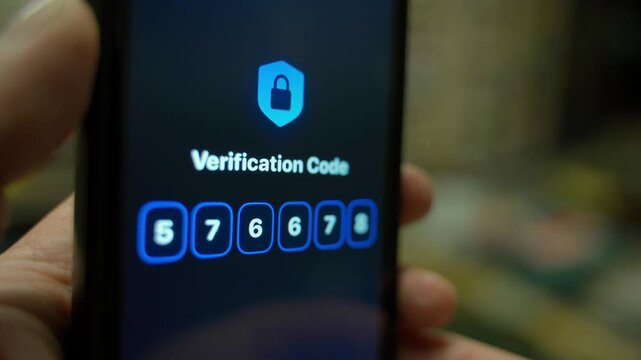 Smartphone screen with verification code close-up in dark room. Entering and confirming verification code 