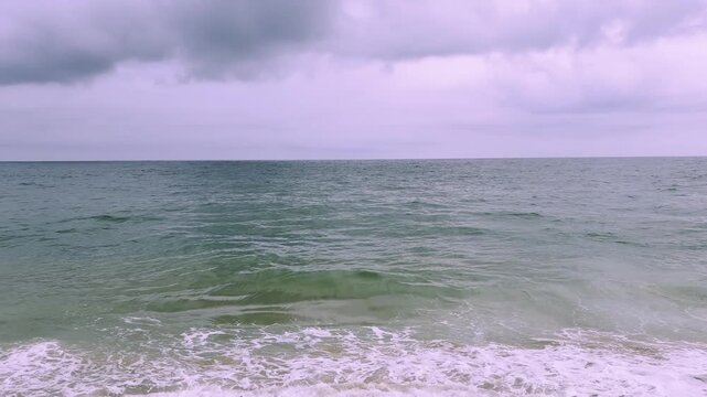 A beautiful beach with waves coming to shore