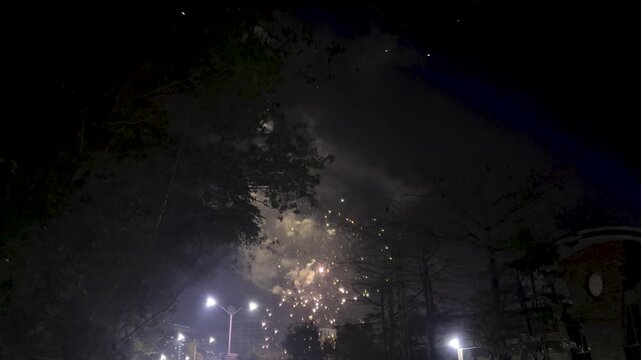 Diwali festival celebration in the city with fireworks on road