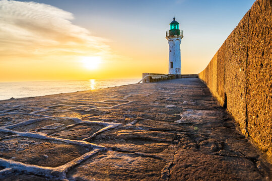 Saint Valery en Caux lighthouse at sunset in Normandy France