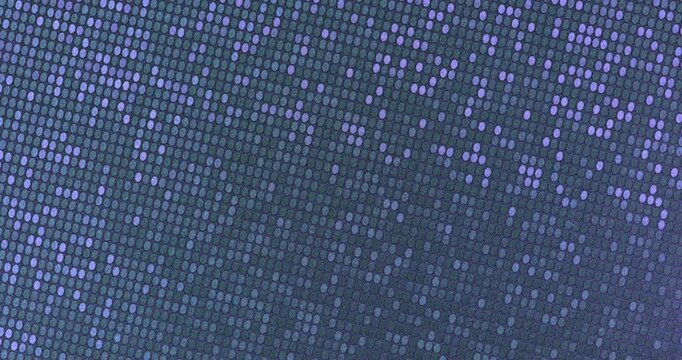 Dense sparkling sequins in vibrant colors tones, smooth rotation in seamless loop. Ideal for fashion, party and glamour backgrounds.